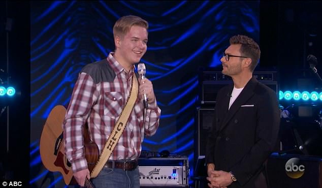 Caleb Hutchinson with host Ryan Seacrest